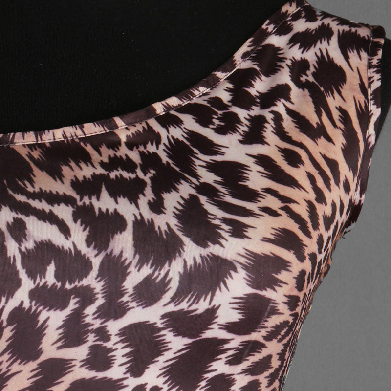 Close view of the leopard print across the one shoulder bodice