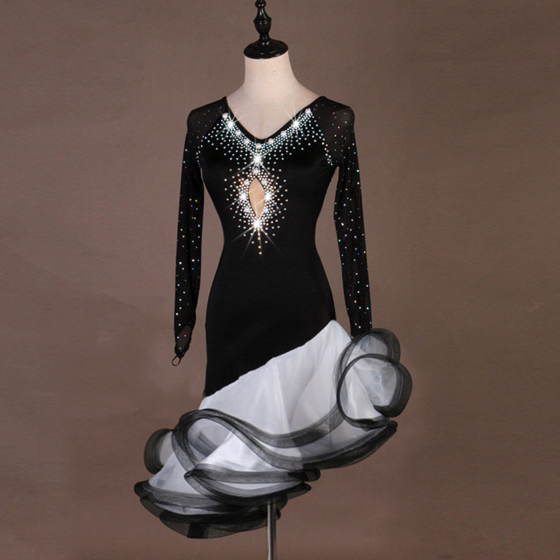 Black latin dance dress angled view showing the stoned mesh sleeves