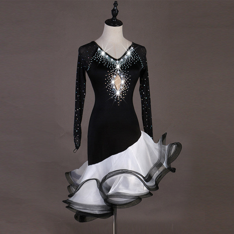 Black latin dance dress side view with the white and black organza curls