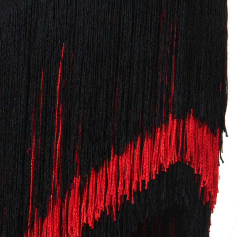 Close view of the red fringe cut on the diagonal hem