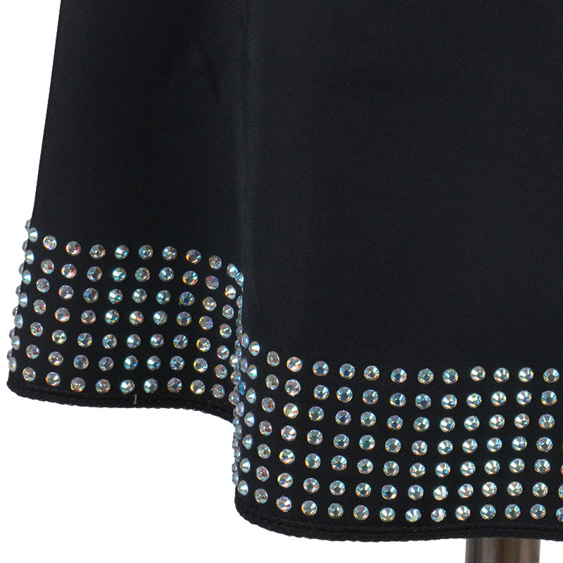 Close view of the stone studded band around the hem