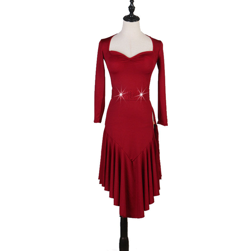 Red latin dance dress angled view showing the front slit in the hem