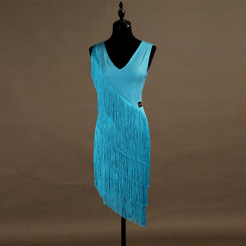 Turquoise spiral fringe latin dance dress angled view with the V neckline