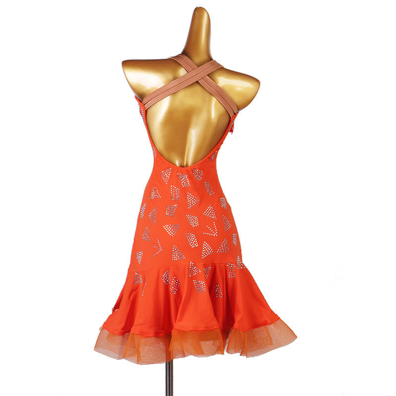 Orange latin dance dress rear view with the crossed straps and mesh hem