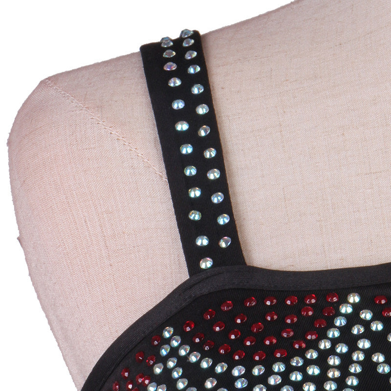 Close view of the studded straps and crystal neckline spray