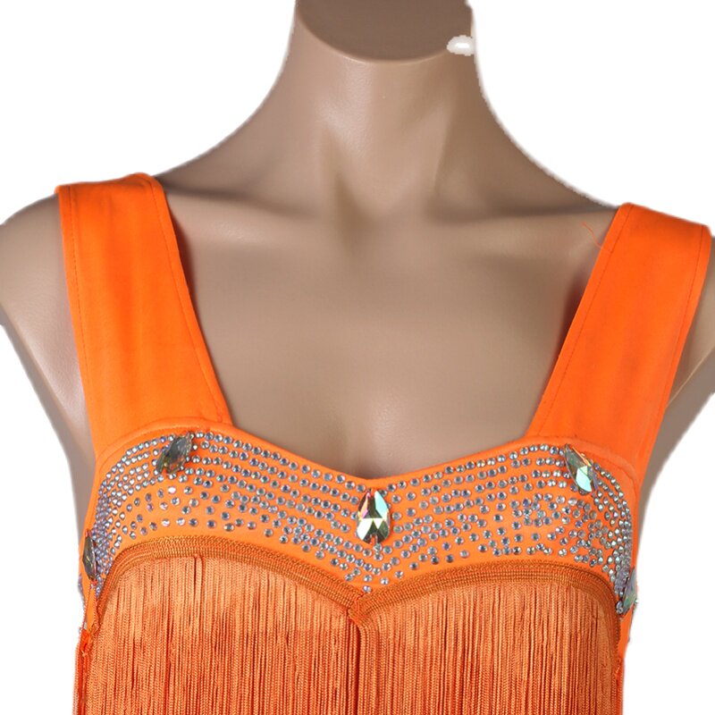 Close view of the crystal set bust band between the wide straps