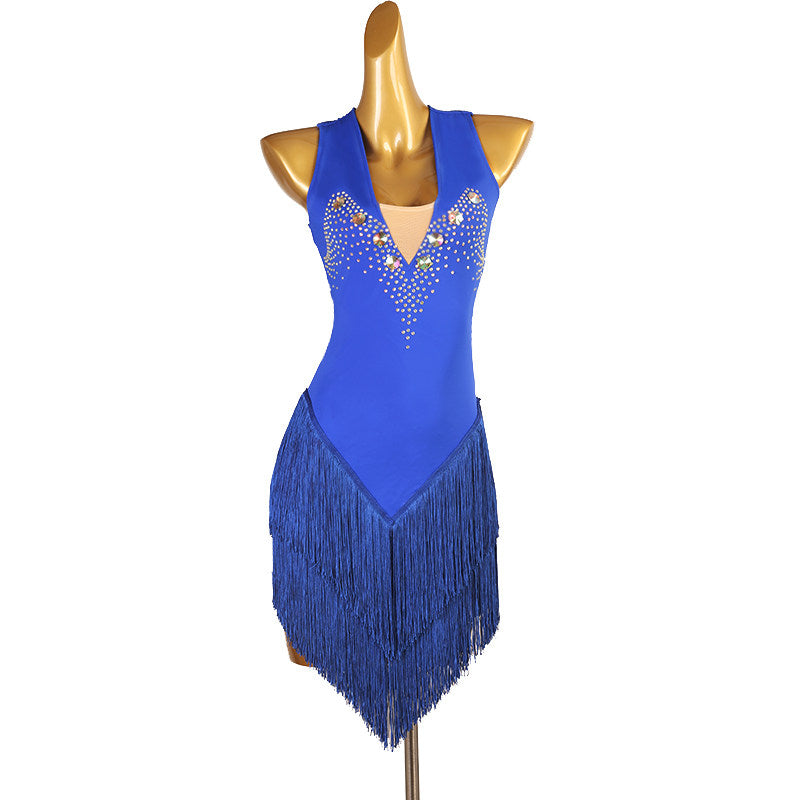Blue ladder back latin dance dress side view showing the fringe fall