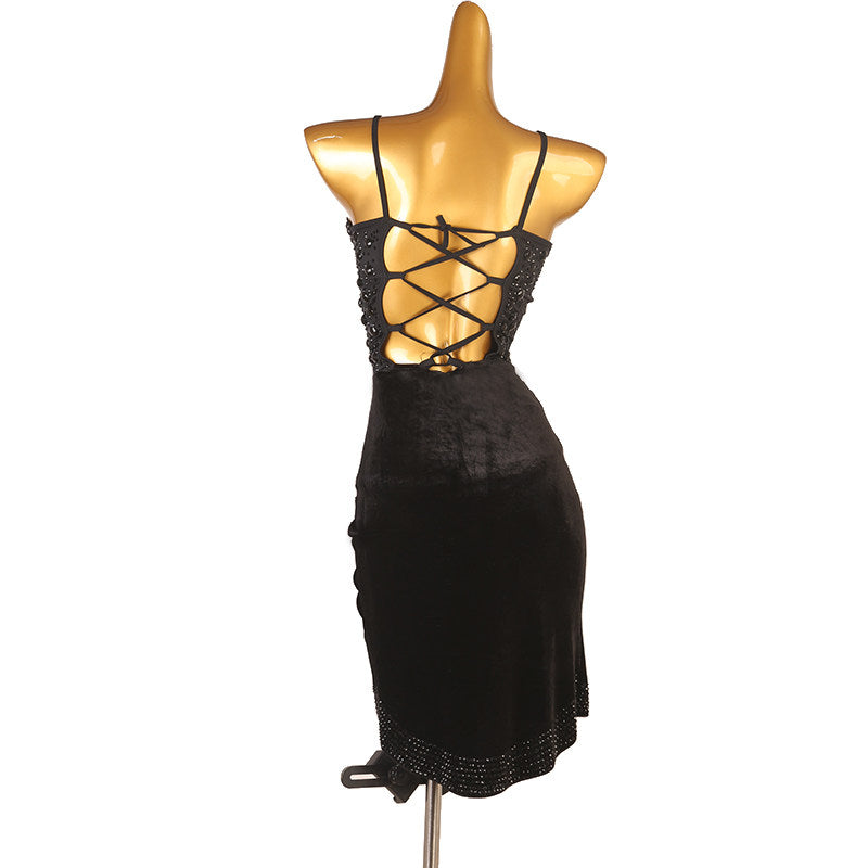 Black ruched wrap latin dance dress side view showing the tie at the hip