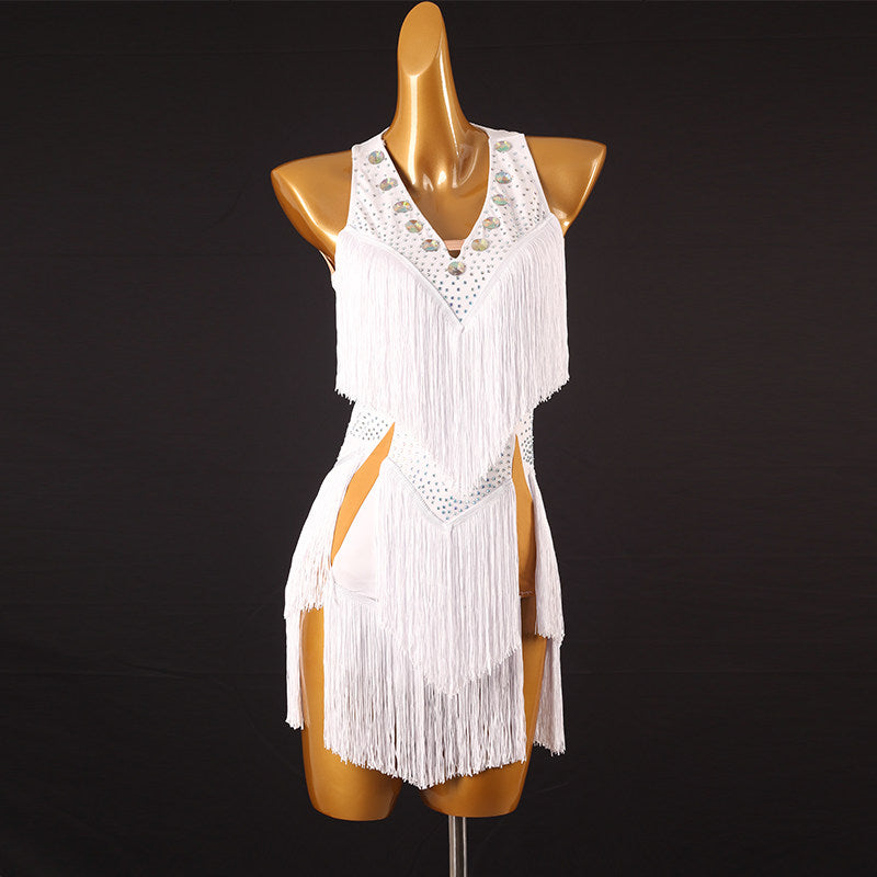 White latin dance dress with stone trimmed chevron fringe and double splits
