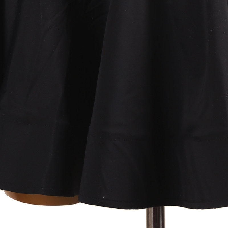Close view of the black circle skirt hem