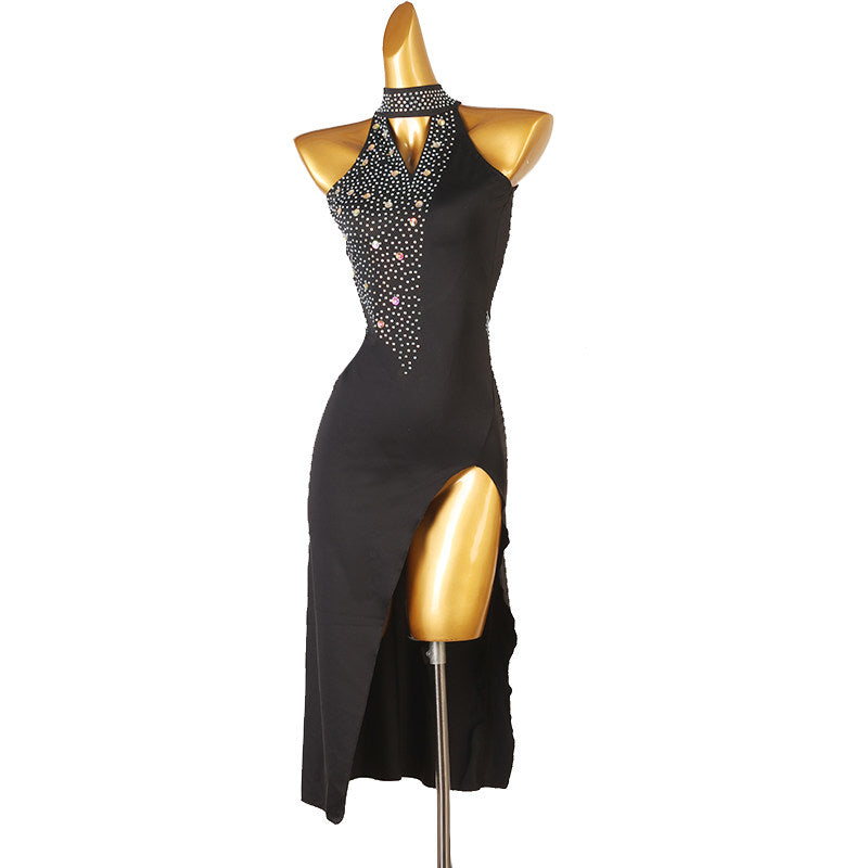 Black stone bib latin salsa dance dress angled view with the deep front split
