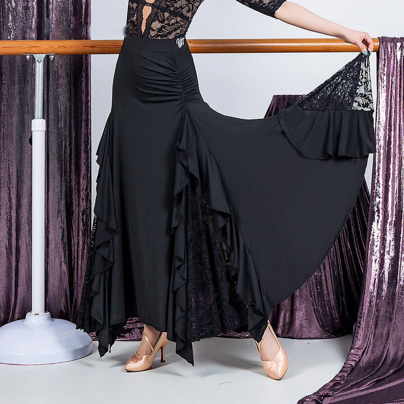 Black ballroom dance skirt with ruched waist and side ruffle cascade, hip and hem view