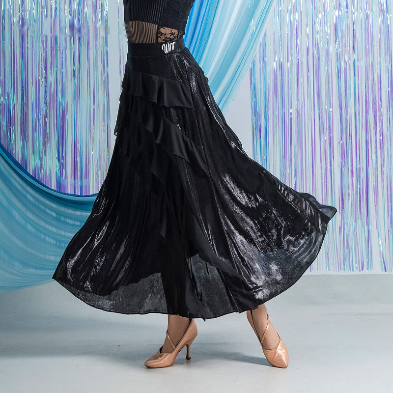 Black ballroom dance skirt with diagonal chiffon ruffle tiers, hip and hem view