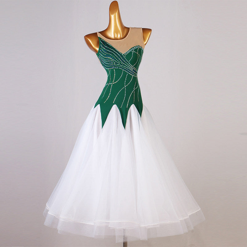 Green rhinestone ballroom competition dress with a full white tulle skirt