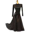 Black velvet ballroom dance dress with chevron panel skirt and mesh shoulder inserts