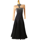 Black ballroom competition dress with a nude illusion yoke and rhinestone neckband