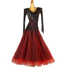Black and red ballroom competition dress with rhinestone rays across the bodice