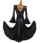 Black bell sleeve ballroom practice dress with satin sash, skirt swept out