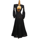 Black ballroom dress back view showing the corset lace-up open back and lantern sleeves