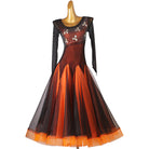 Orange ballroom competition dress with beaded floral mesh yoke and black overlay skirt
