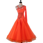 Orange one shoulder ballroom dance dress with beaded bodice on mannequin