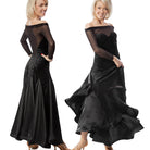 Black ballroom dress with off-shoulder mesh yoke and satin swing skirt shown on two dancers