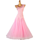 Pink ballroom competition dress with an asymmetric rhinestone bodice and tulle skirt