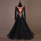 Black ballroom dance dress with rhinestone V panels and long sleeves