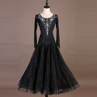 Black ballroom dance dress with pearl and rhinestone beaded bodice on mannequin