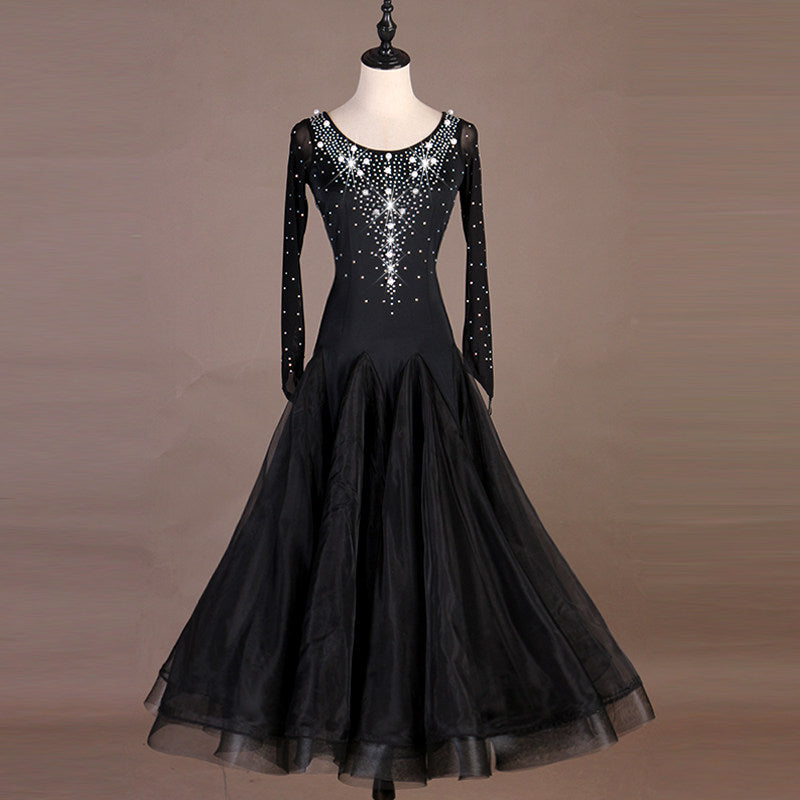 Black ballroom dance dress with pearl and rhinestone beaded bodice on mannequin