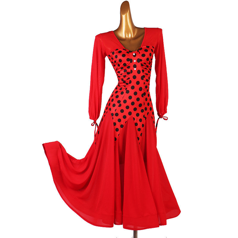 Red polka dot ballroom practice dress with the circle skirt swept out to the left