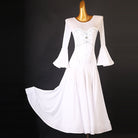 White ballroom competition dress with a beaded sweetheart bodice and bell sleeves