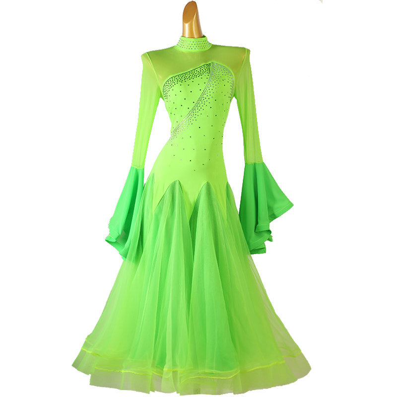 Neon green ballroom competition dress with a rhinestone bodice and tiered sleeves