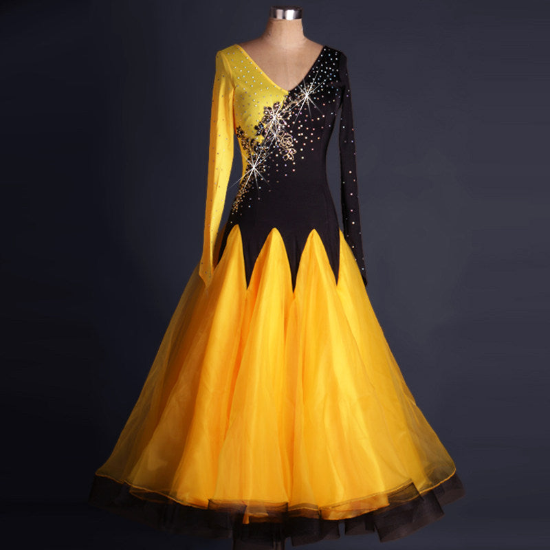 Yellow ballroom gown with asymmetric embroidered black velvet bodice and zigzag hem