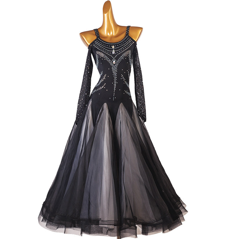 Black ballroom competition dress with a rhinestone banded neckline and tulle skirt