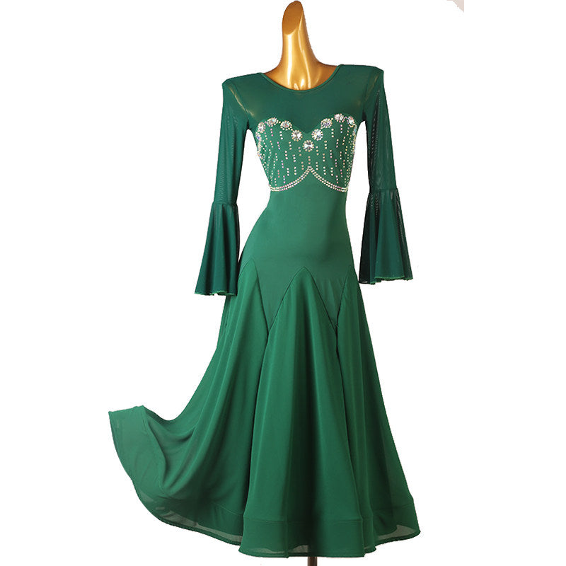 Green ballroom dress with beaded sweetheart bodice and flared sleeves, skirt swept out