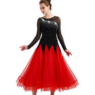 Black and red ballroom gown with rhinestone mesh yoke worn by a dancer
