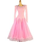 Pink ballroom competition dress with a rhinestone illusion yoke and tulle skirt