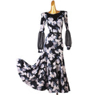 Black and ivory floral print ballroom dance dress with the skirt swept to the side