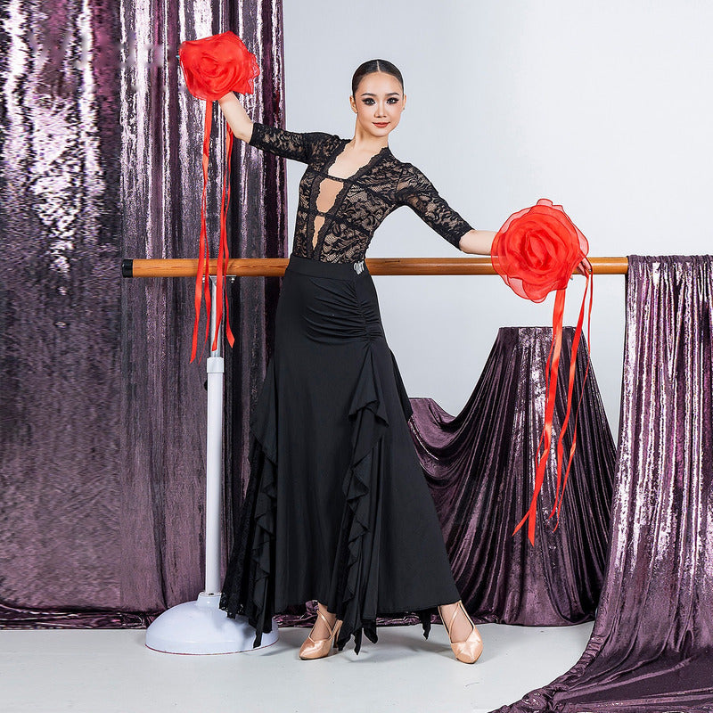 Full length black ballroom practice skirt with lace insert ruffles and pointed hem