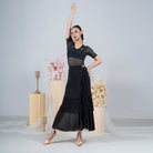 Side ruffle cascade and wrap panel of the black ballroom dance skirt