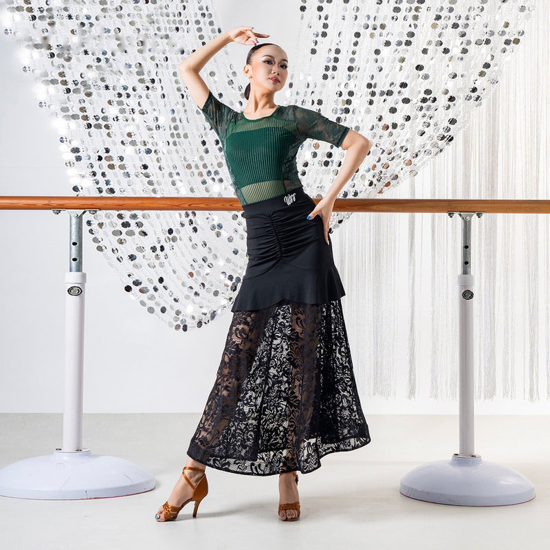Ruched hip yoke and peplum flounce on the black lace ballroom skirt