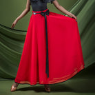 Red tiered chiffon ballroom dance skirt with satin ribbon trim, hip and hem view
