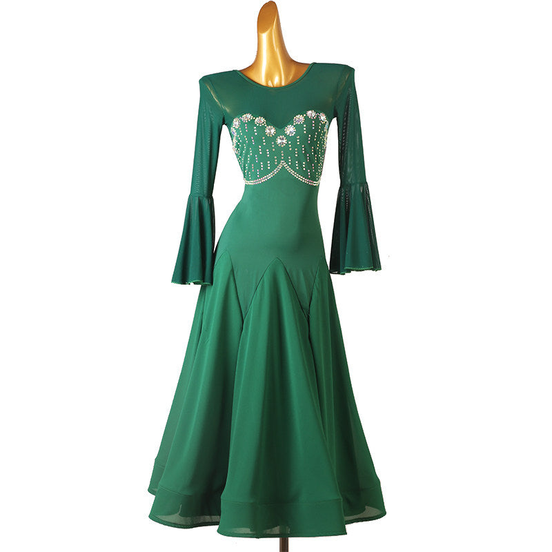 Green ballroom dance dress front view on mannequin with full swing skirt
