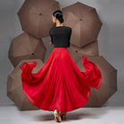 Back view of the red double layer chiffon ballroom dance skirt swept wide in motion