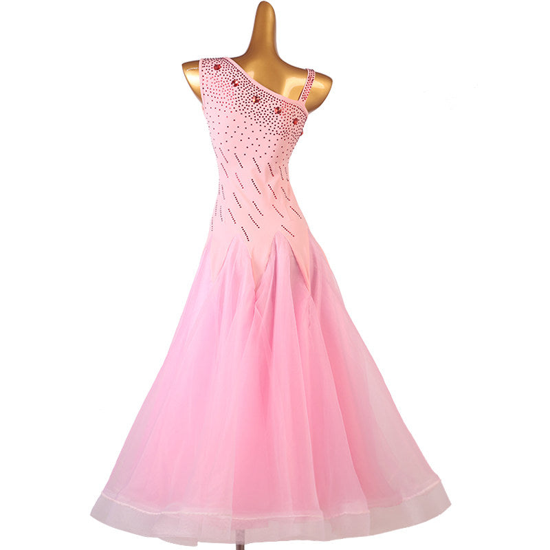Pink asymmetric ballroom dress showing the wide stoned shoulder band