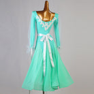 Back view of the mint green dance dress showing lace edging and long satin sash streamers