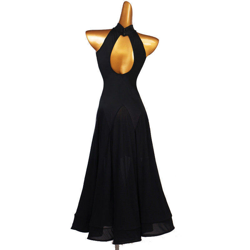 Back view of the black halter dance dress showing the teardrop keyhole