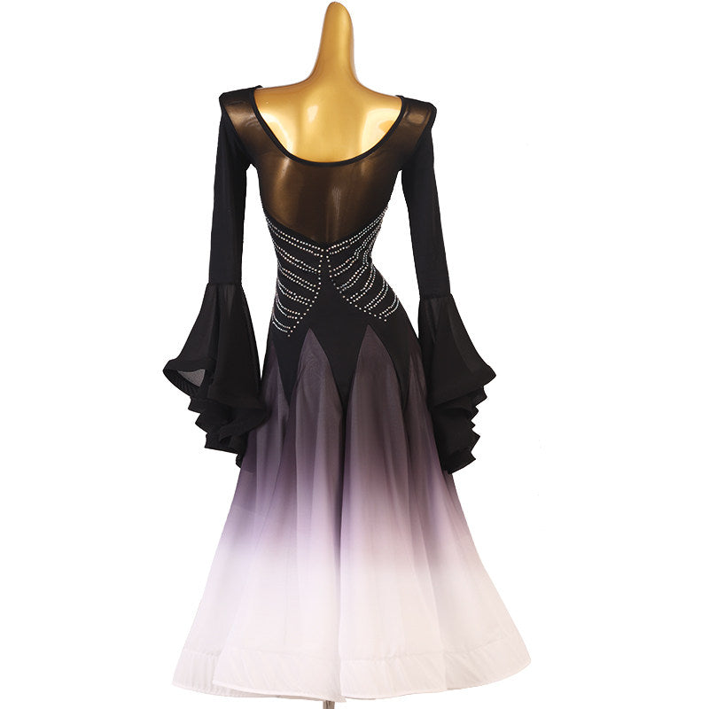 Black rhinestone starburst dress with the tiered bell sleeves spread