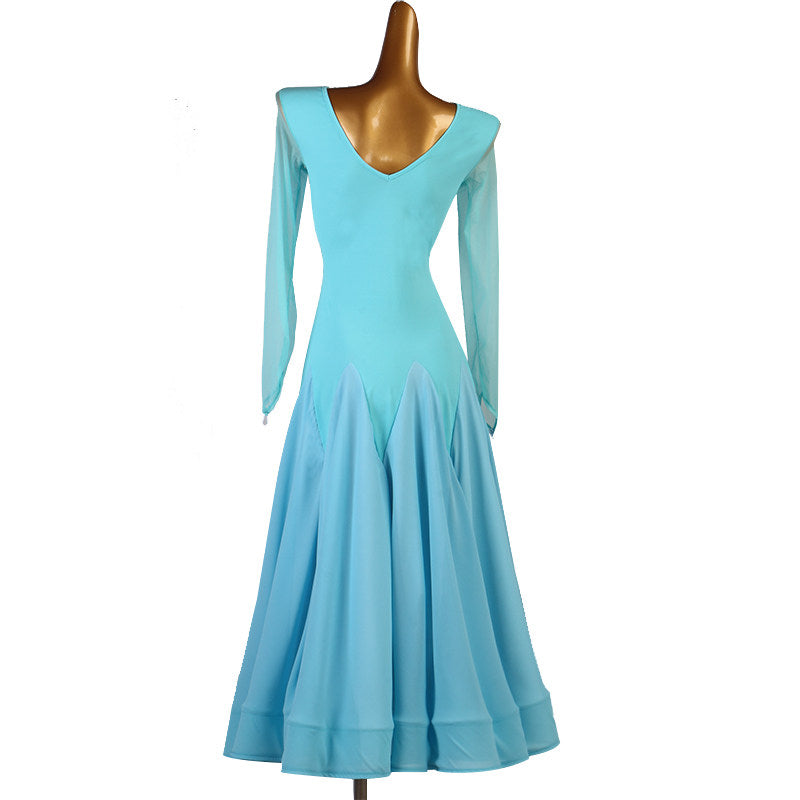 Light blue practice dress front view with the mesh V insert and long mesh sleeves